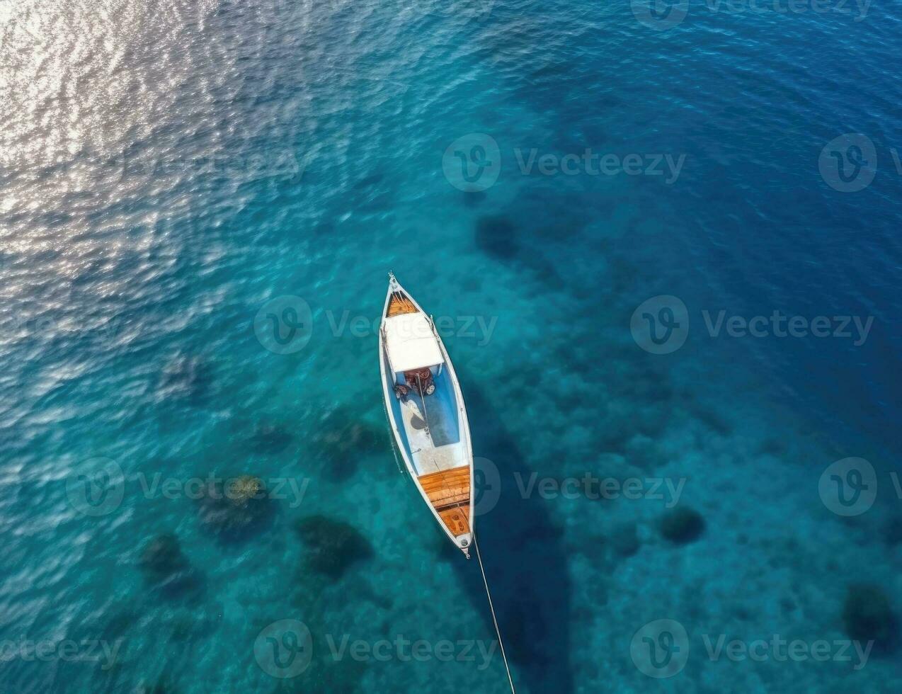 Aerial view aerial view of little boat gliding on sea photo