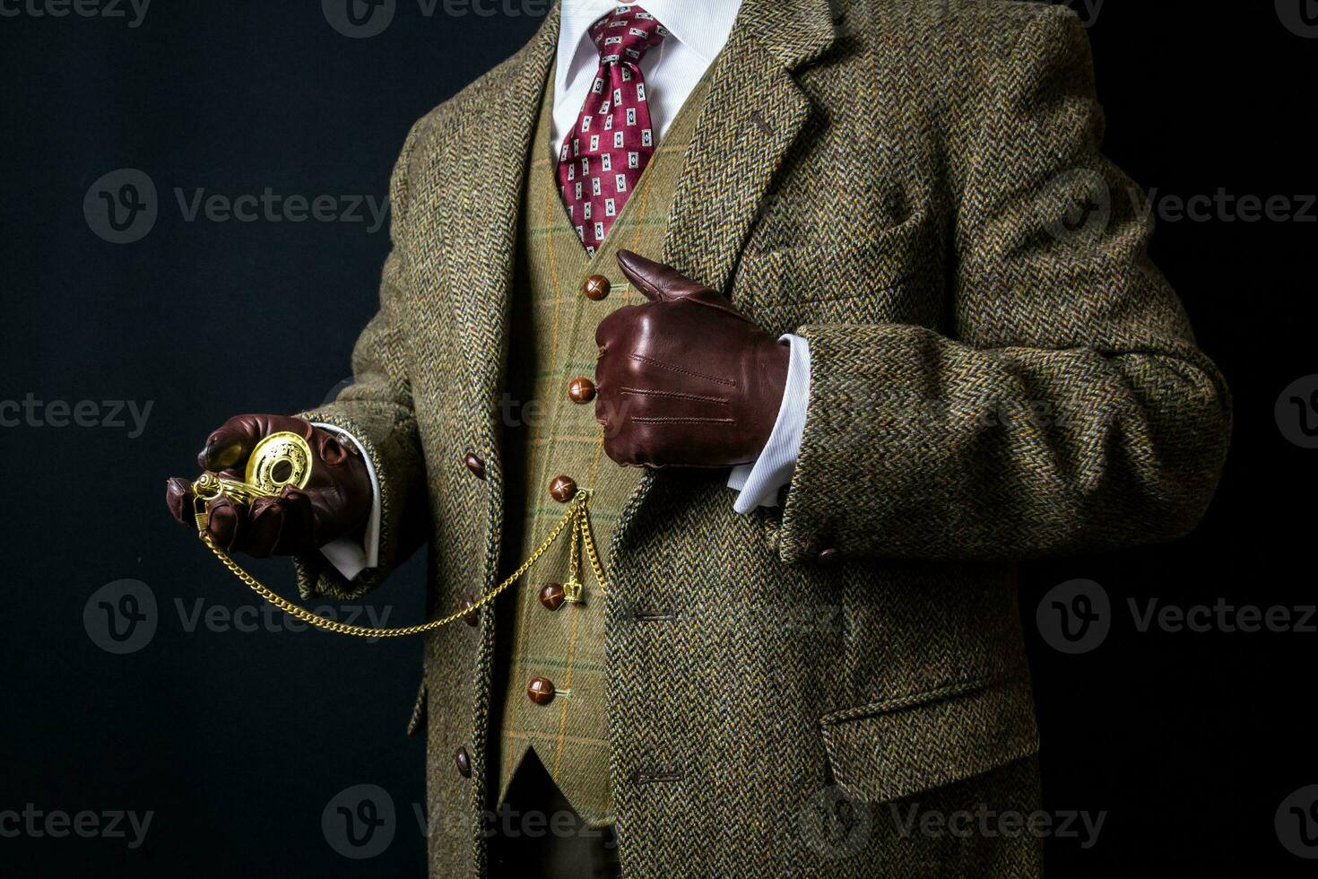 Portrait of Gentleman in Tweed Suit and Leather Gloves Standing Elegantly. Vintage Style and Retro Fashion of English Gentleman. photo