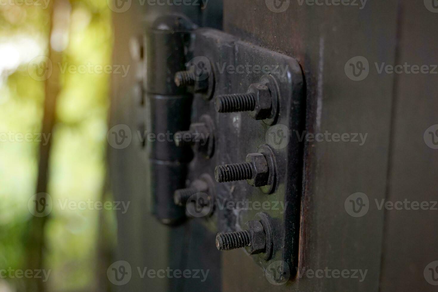 hinged wooden fence gate is a device that helps to transfer force Or support the weight of doors or furniture with openings that allow users to conveniently open and close the door easily. photo