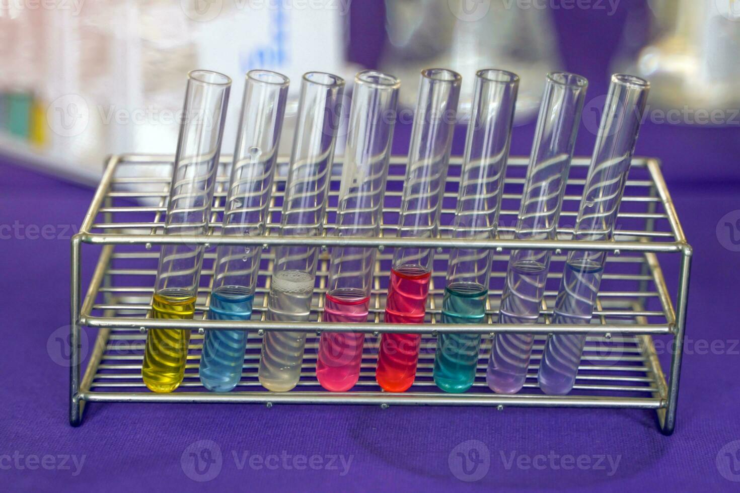 a solution in a scientific test tube Set up to observe, record results, and summarize experimental results. Soft and selective focus. photo