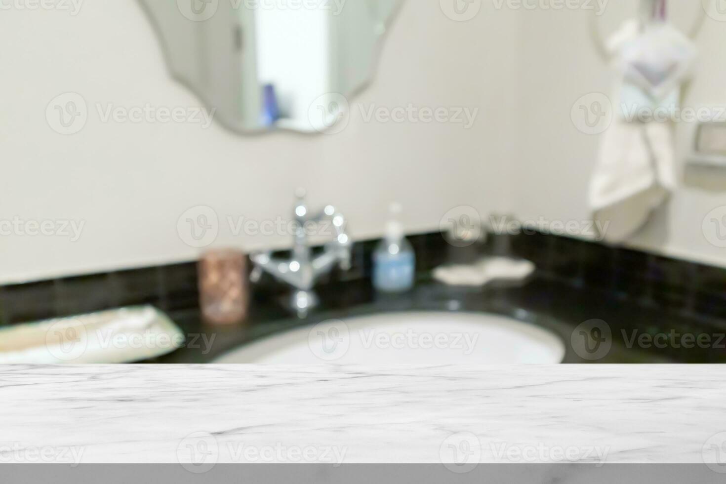 Empty white marble table top with blur bathroom background photo