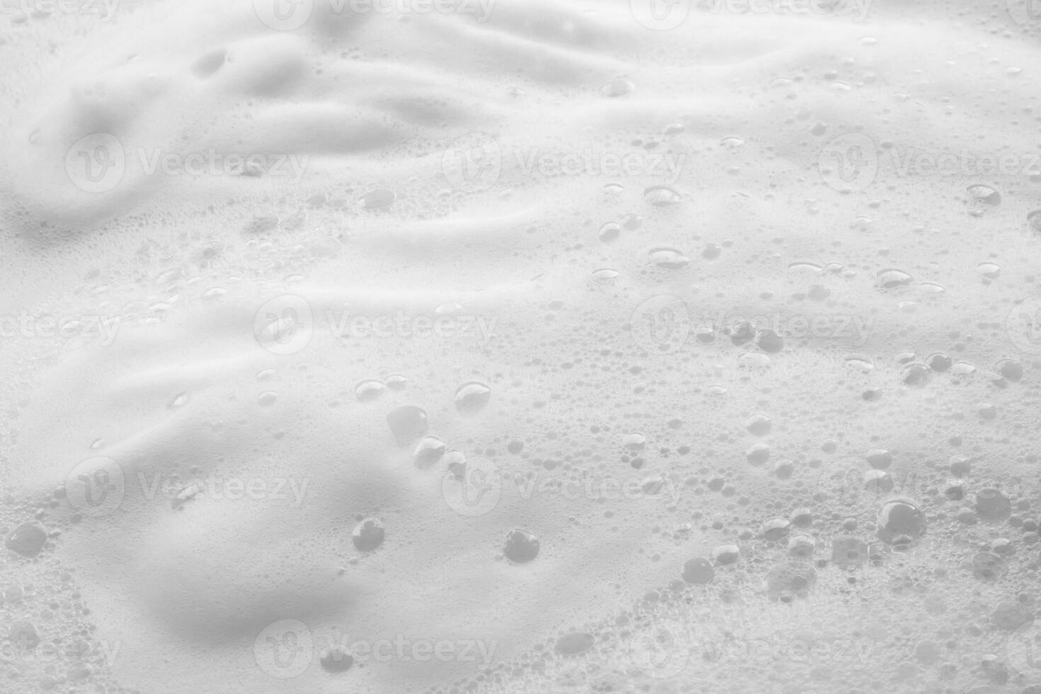 Abstract white soap foam bubbles texture background photo