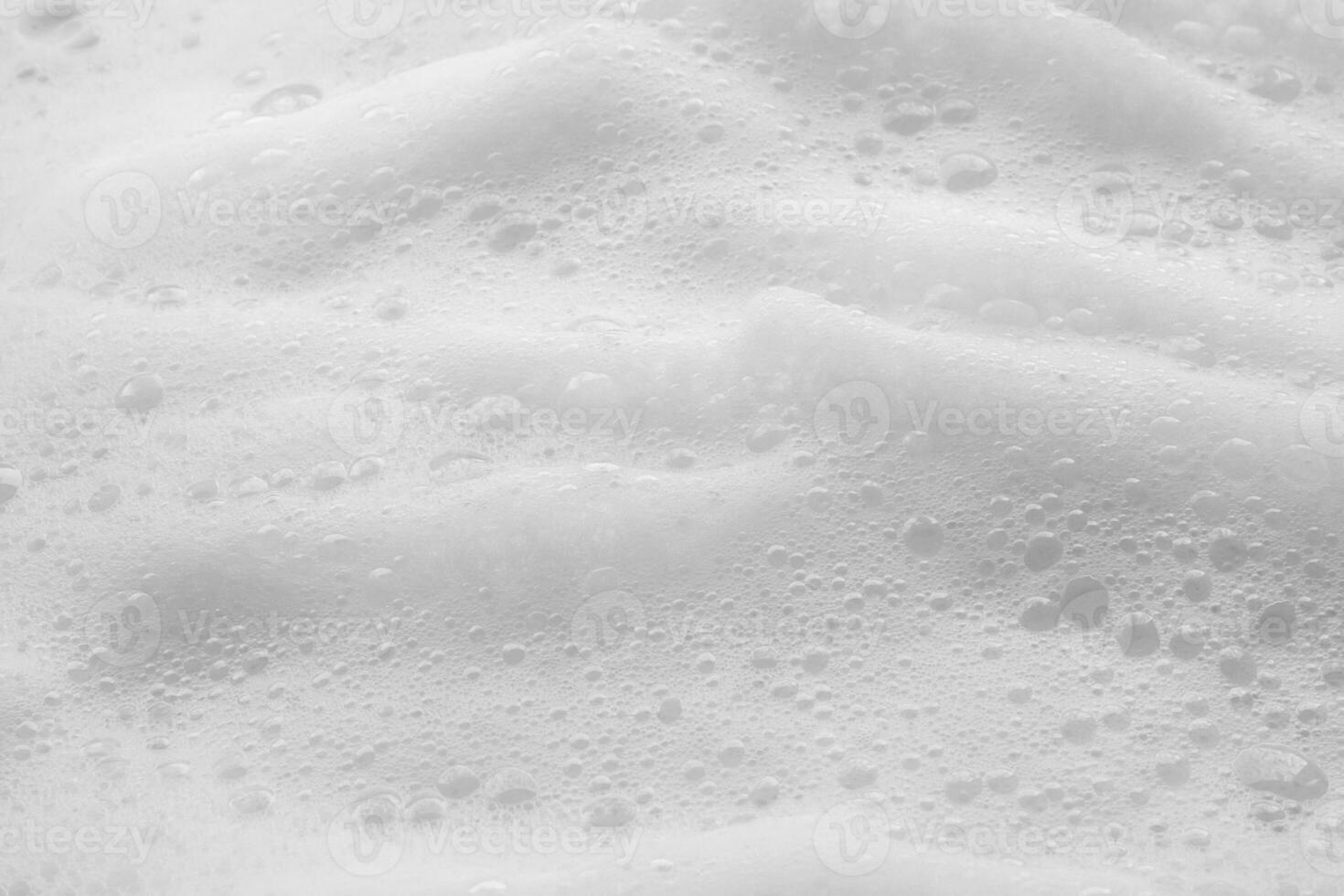 Abstract white soap foam bubbles texture background photo