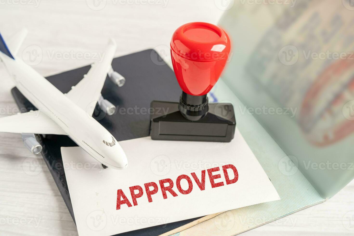 Approved Stamp visa and passport document to immigration at airport in country. photo