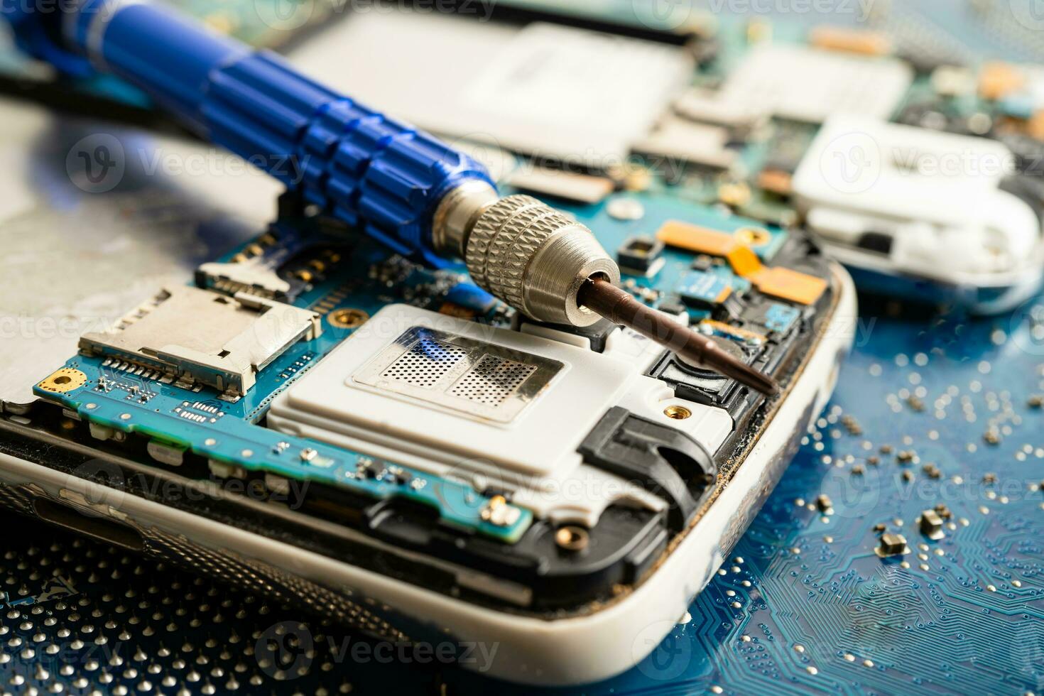 Repairing and upgrade mobile phone, electronic, computer hardware and technology concept. photo