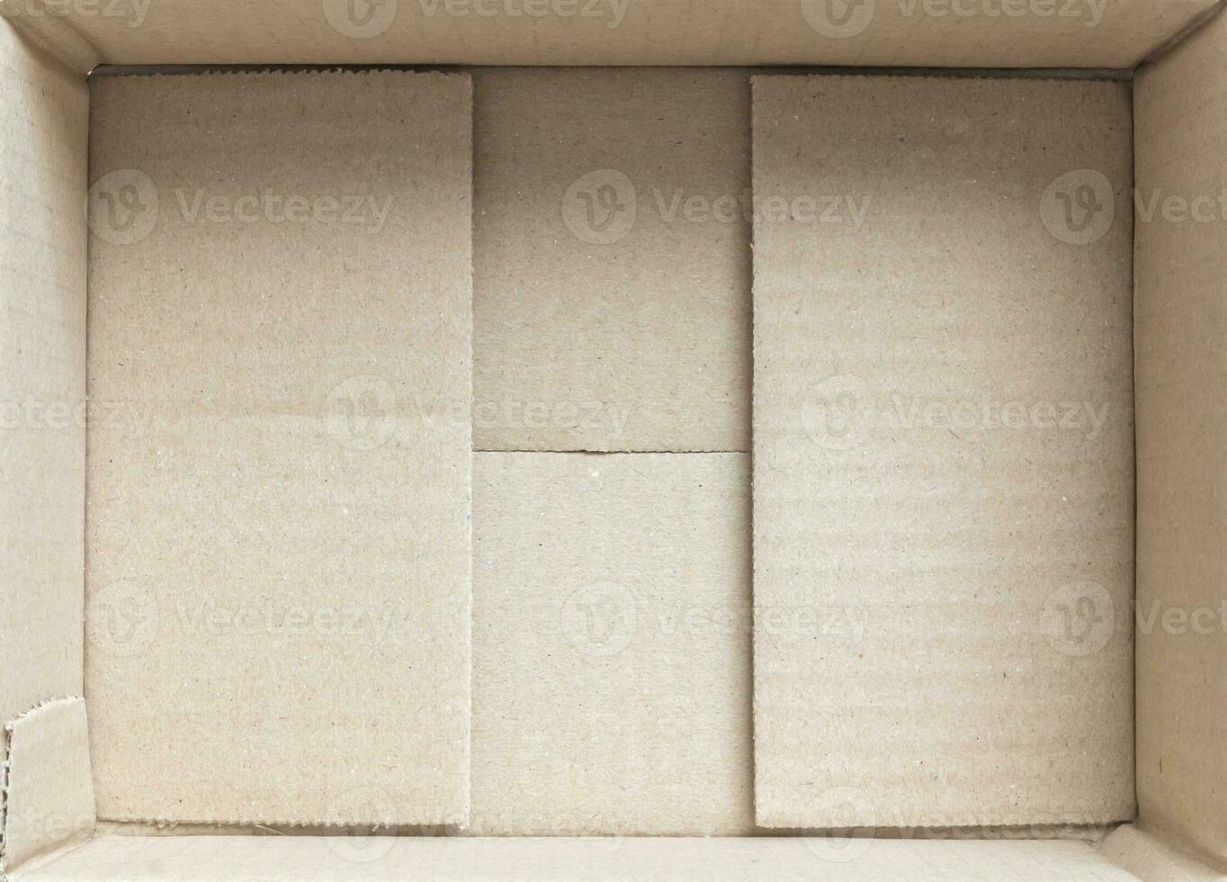 Open empty brown cardboard box background top view photo