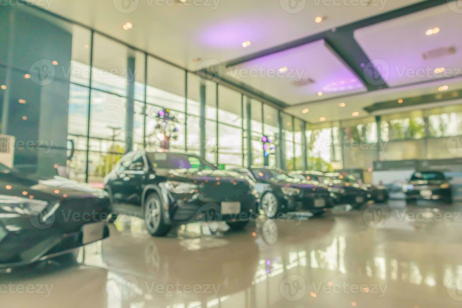 new cars in showroom interior blurred abstract background photo