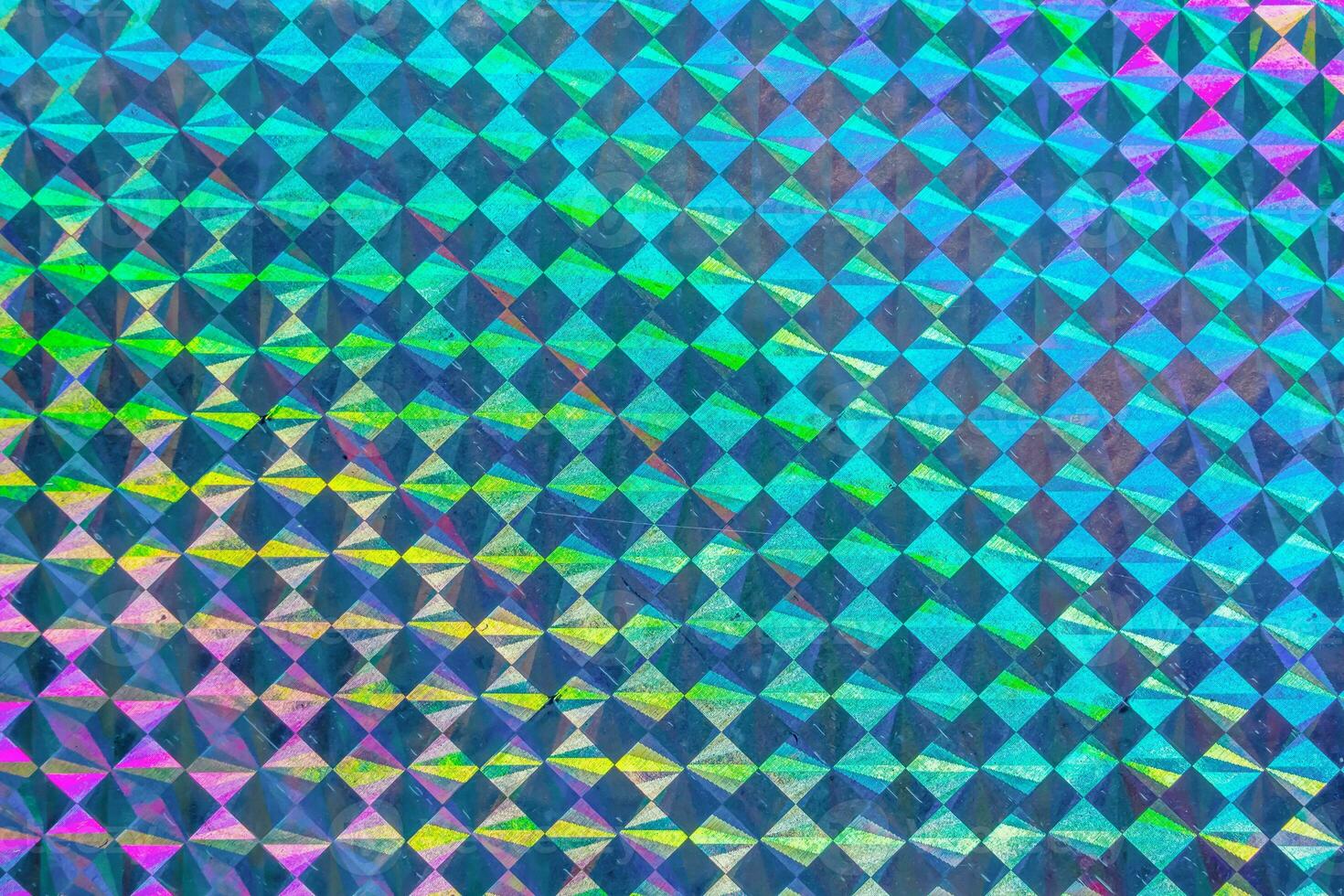 Holographic rainbow foil iridescent texture abstract hologram background photo