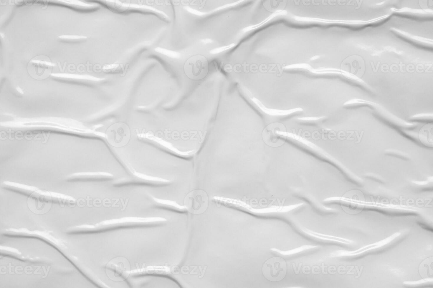 white crumpled and creased plastic bag texture background photo