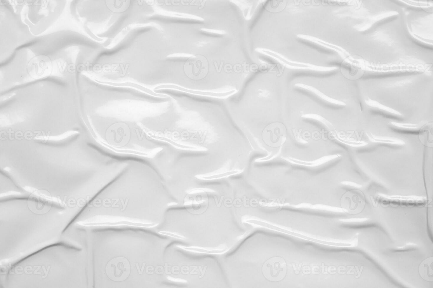 white crumpled and creased plastic bag texture background photo