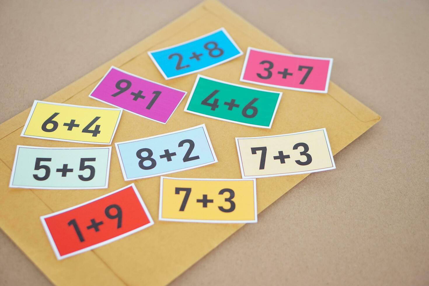 Cards for math subject, numbers plus , addition on colorful cards. Concept, teaching aid, materials for Math subject. Education. Calculation lesson. Cards for game or practice in teaching procedure. photo