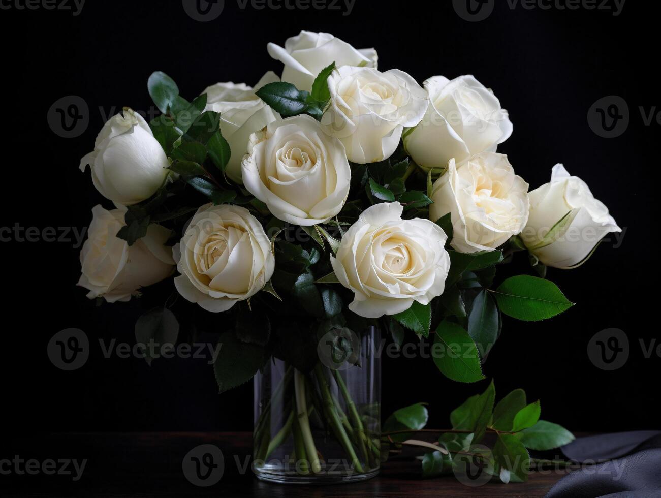 Still Life Photograph of White Roses with Green Leaves on Black Table from High Angle - photo