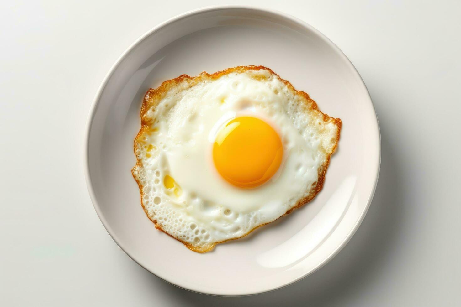 an egg on a white plate on a white background AI Generated photo