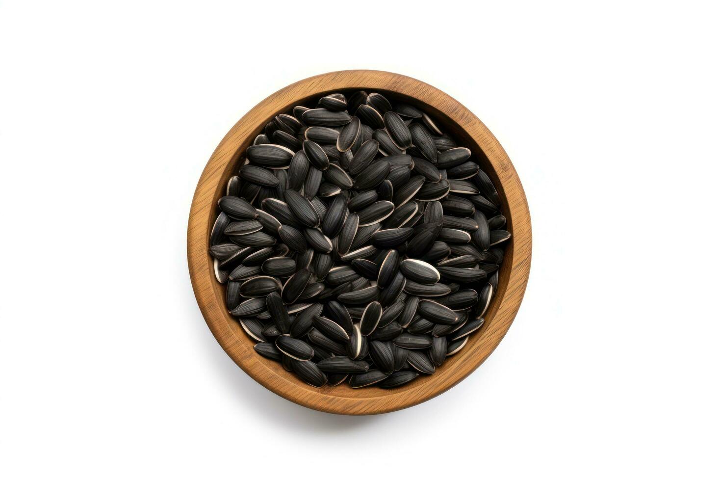 top view black sunflower seeds in a wooden bowl on a white background AI Generated photo