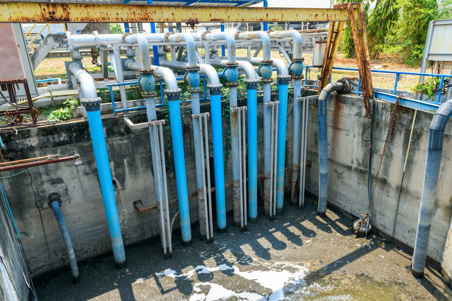 Water pipes connected to large water pumps are used to pump wastewater into the wastewater treatment photo