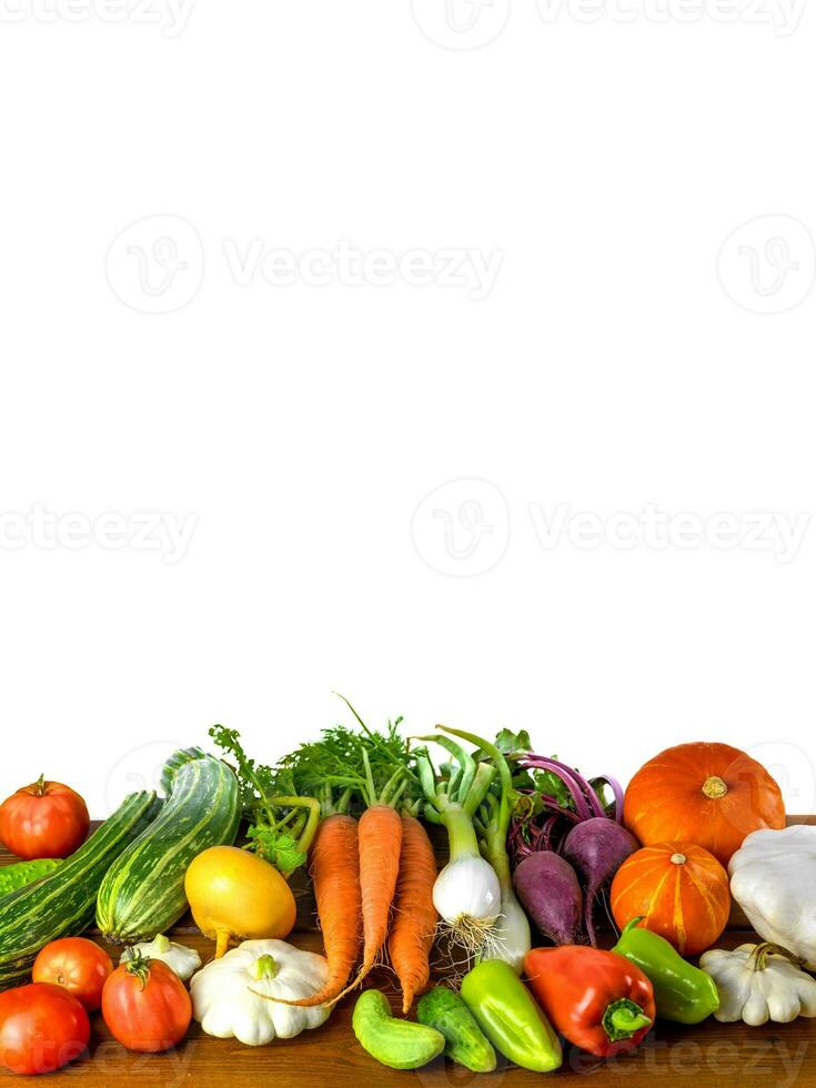 Healthy food background. Food photography of various vegetables isolated on white background. Space for copy. photo