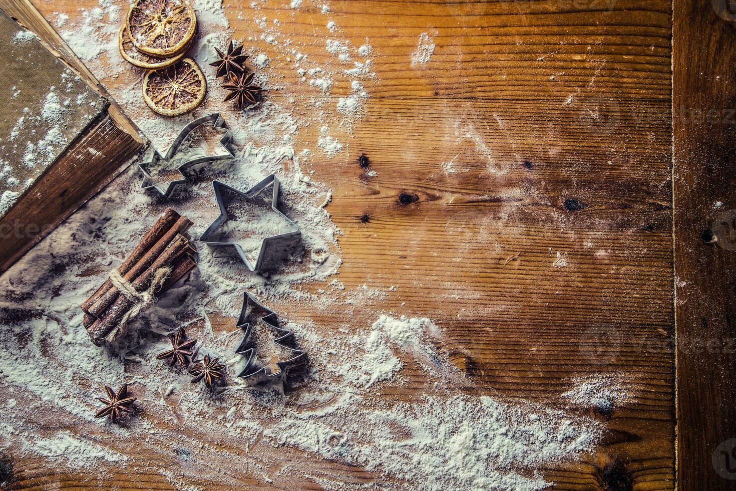 Top of view bakery table full of christmas aromatic ingredients photo
