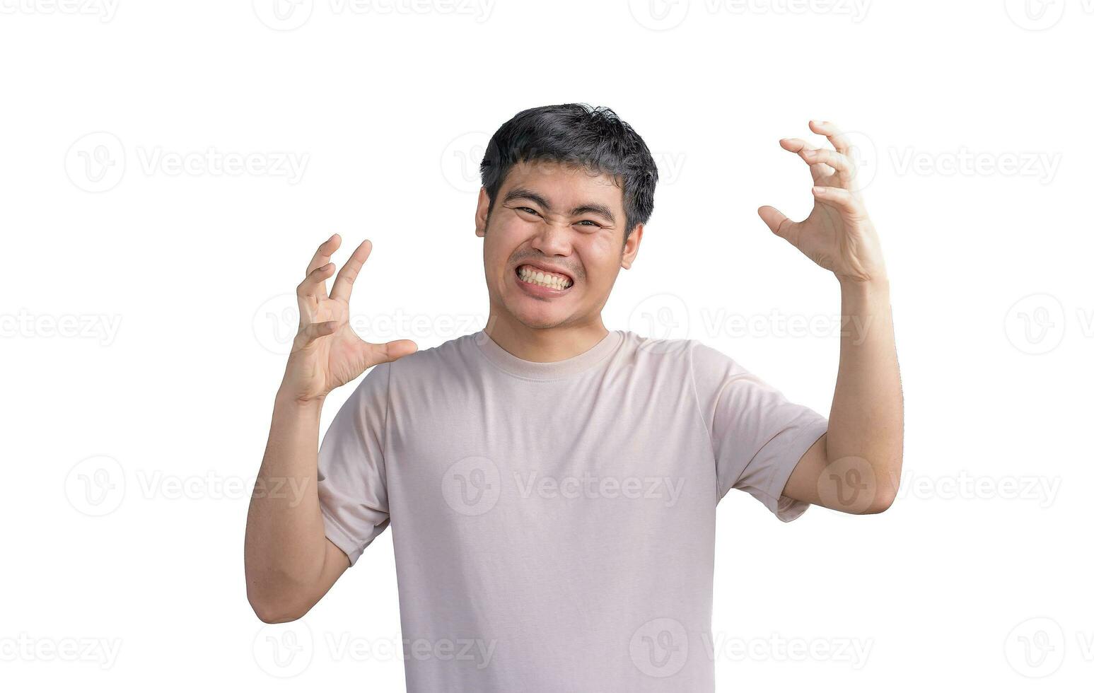 Portrait of angry or annoyed young Asian Thai man casual t-shirt looking at the camera with displeased expression. Negative human expressions, emotions, and feelings. Body language. photo