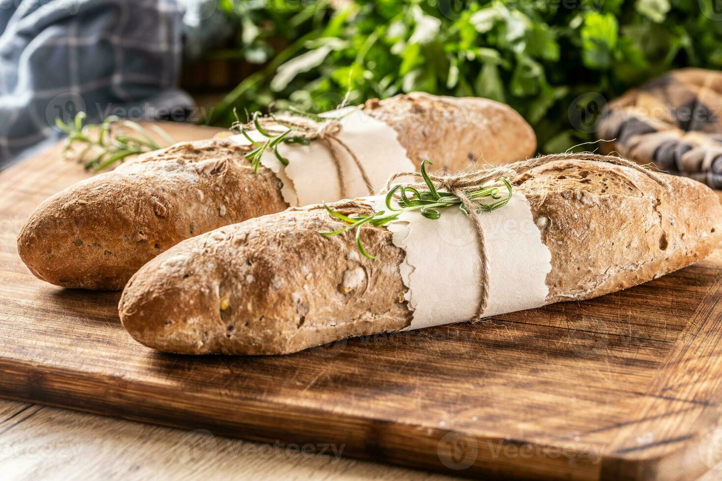 French wholegrain baguette baked fresh and ready for sale photo