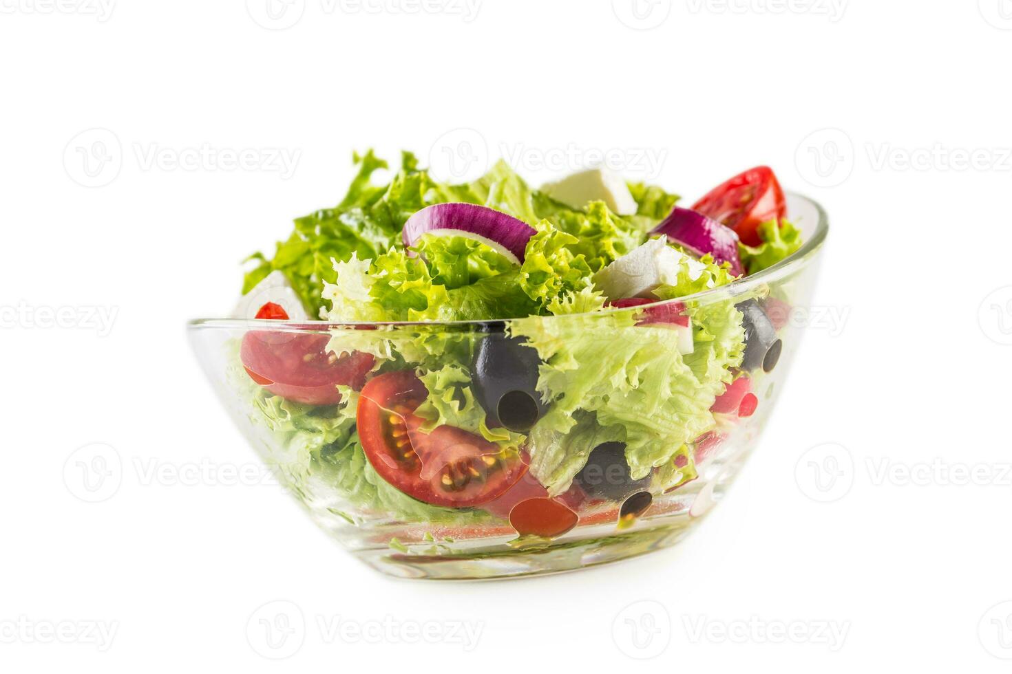 Fresh vegetable salad in bowl isolated on white photo