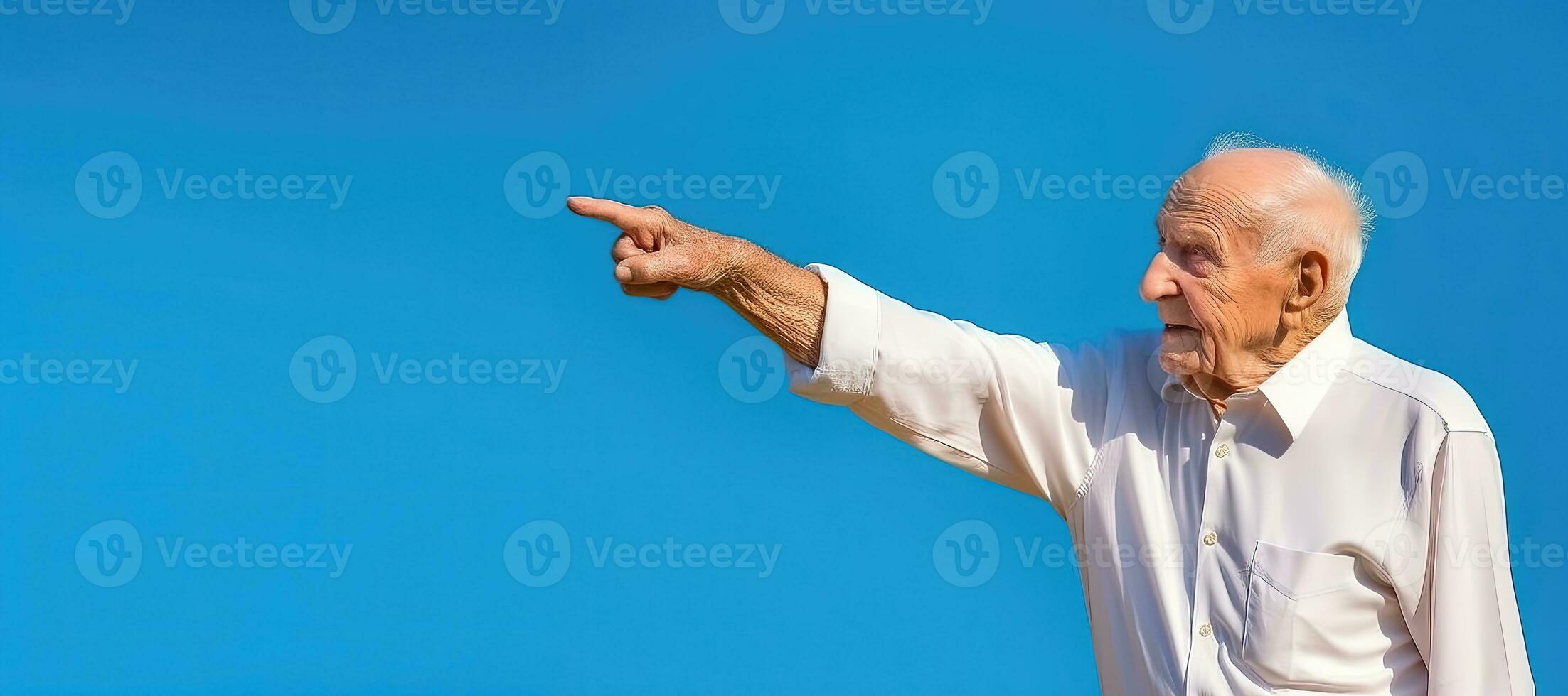 Elderly man pointing.Blue background. Copy space - AI Generative photo