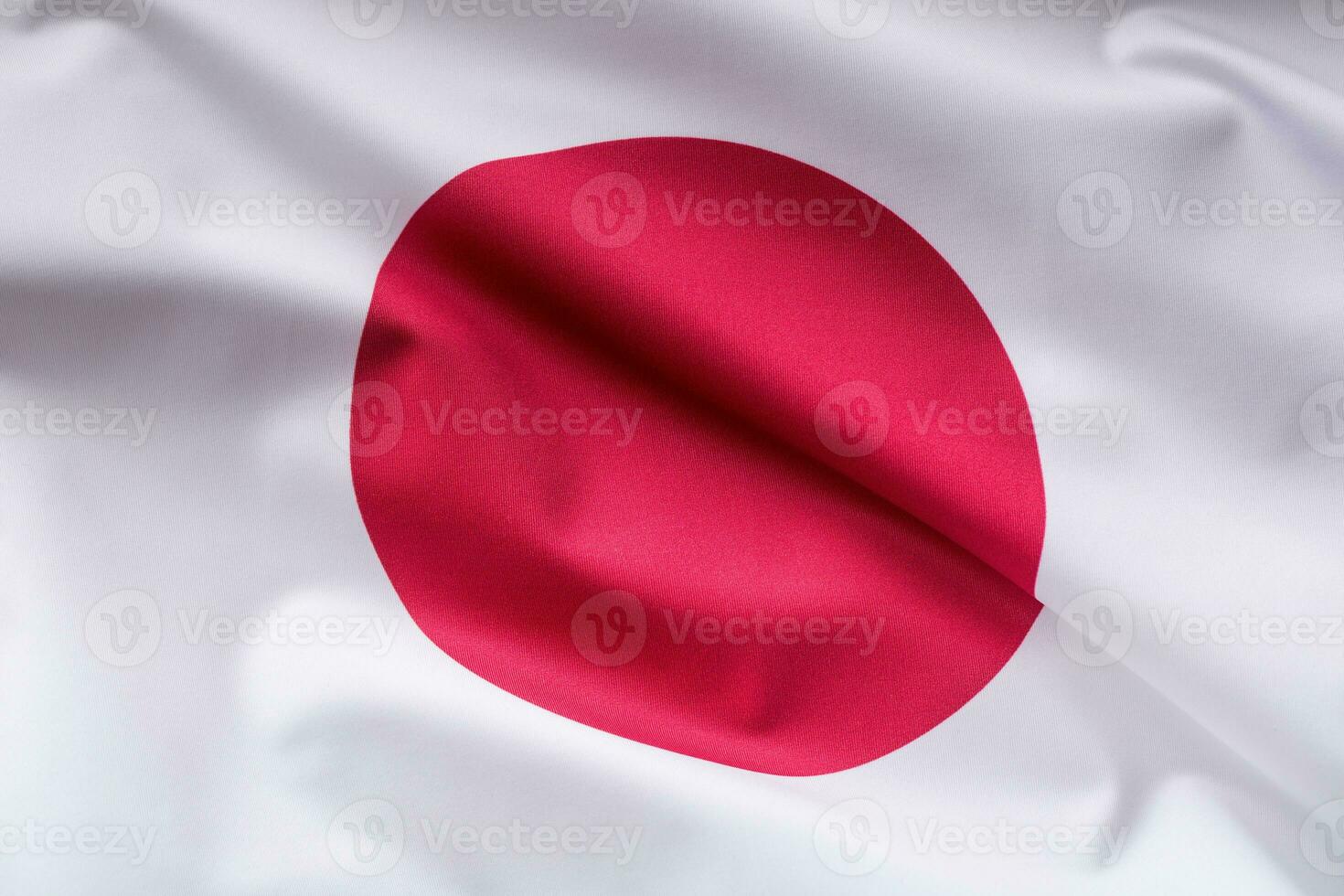 Japanese flag blowing in the wind. photo