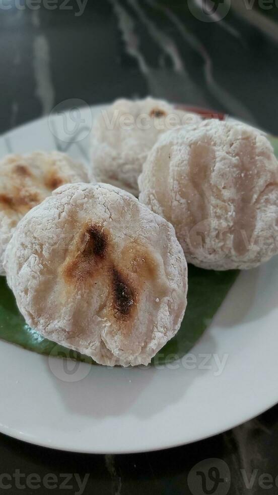 traditional Indonesian food of South Sumatra, Palembang. grilled fish cake. pempek panggang, pempek tunu. photo
