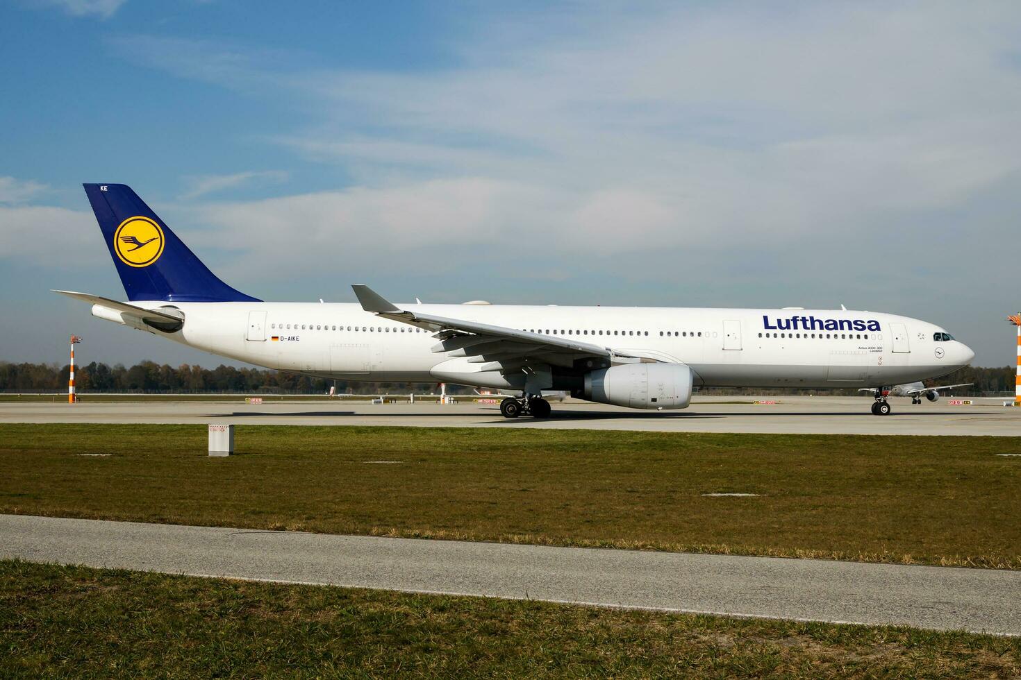 Lufthansa passenger plane at airport. Schedule flight travel. Aviation and aircraft. Air transport. Global international transportation. Fly and flying. photo