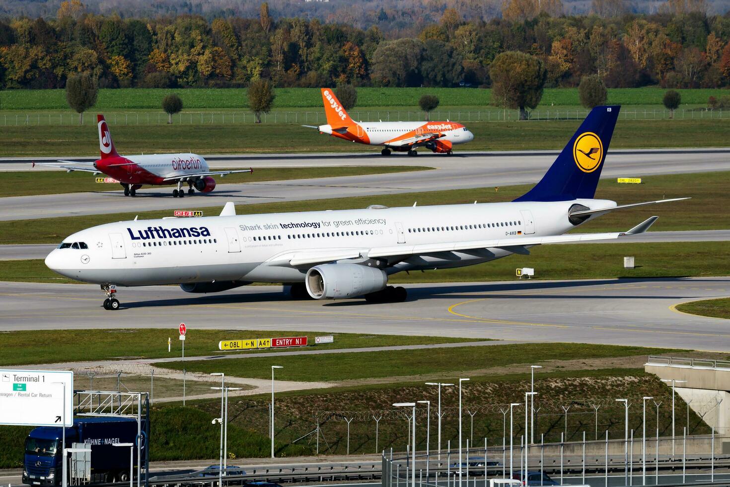 Lufthansa passenger plane at airport. Schedule flight travel. Aviation and aircraft. Air transport. Global international transportation. Fly and flying. photo