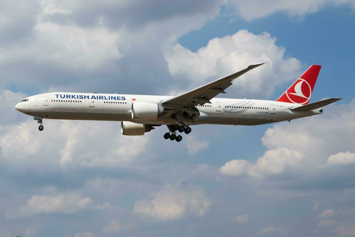 Turkish Airlines Boeing 777-300ER TC-JJO passenger plane landing at London Heathrow Airport photo