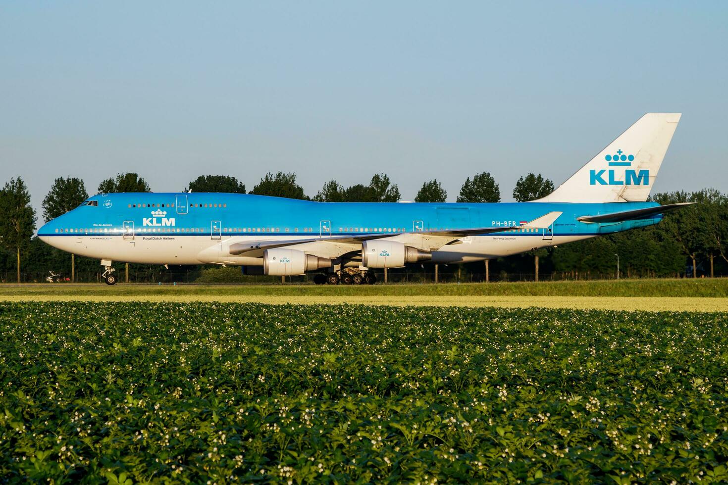 KLM Royal Dutch Airlines Boeing 747-400 PH-BFR passenger plane taxiing at Amsterdam Schipol Airport photo