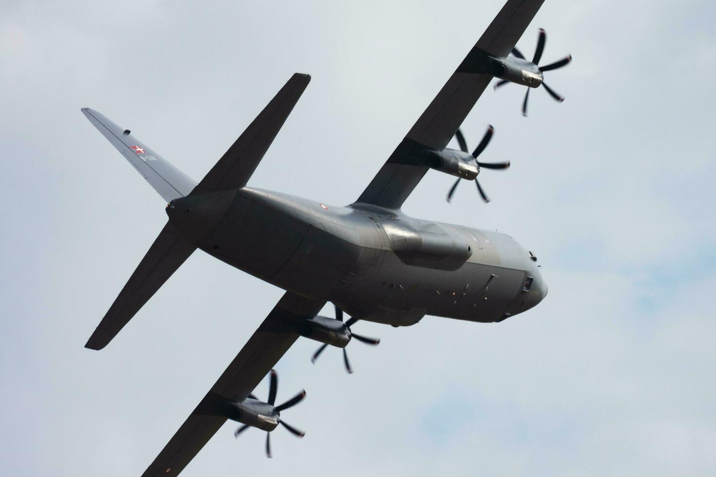 Military transport plane at air base. Air force flight operation. Aviation and aircraft. Air defense. Military industry. Fly and flying. photo