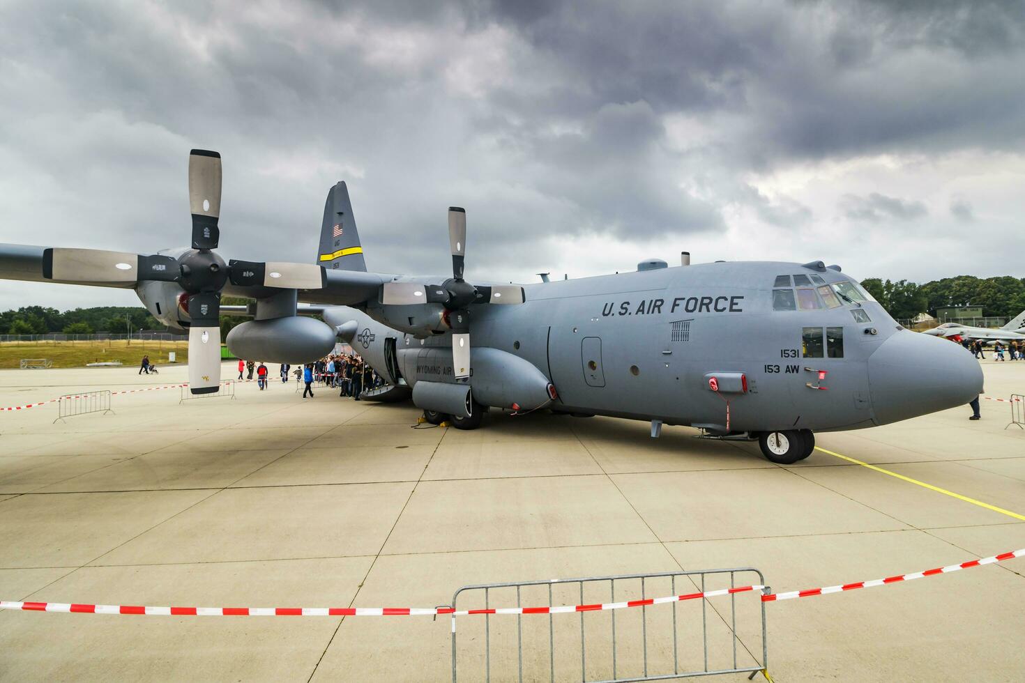 Military transport plane at air base. Air force flight operation. Aviation and aircraft. Air defense. Military industry. Fly and flying. photo