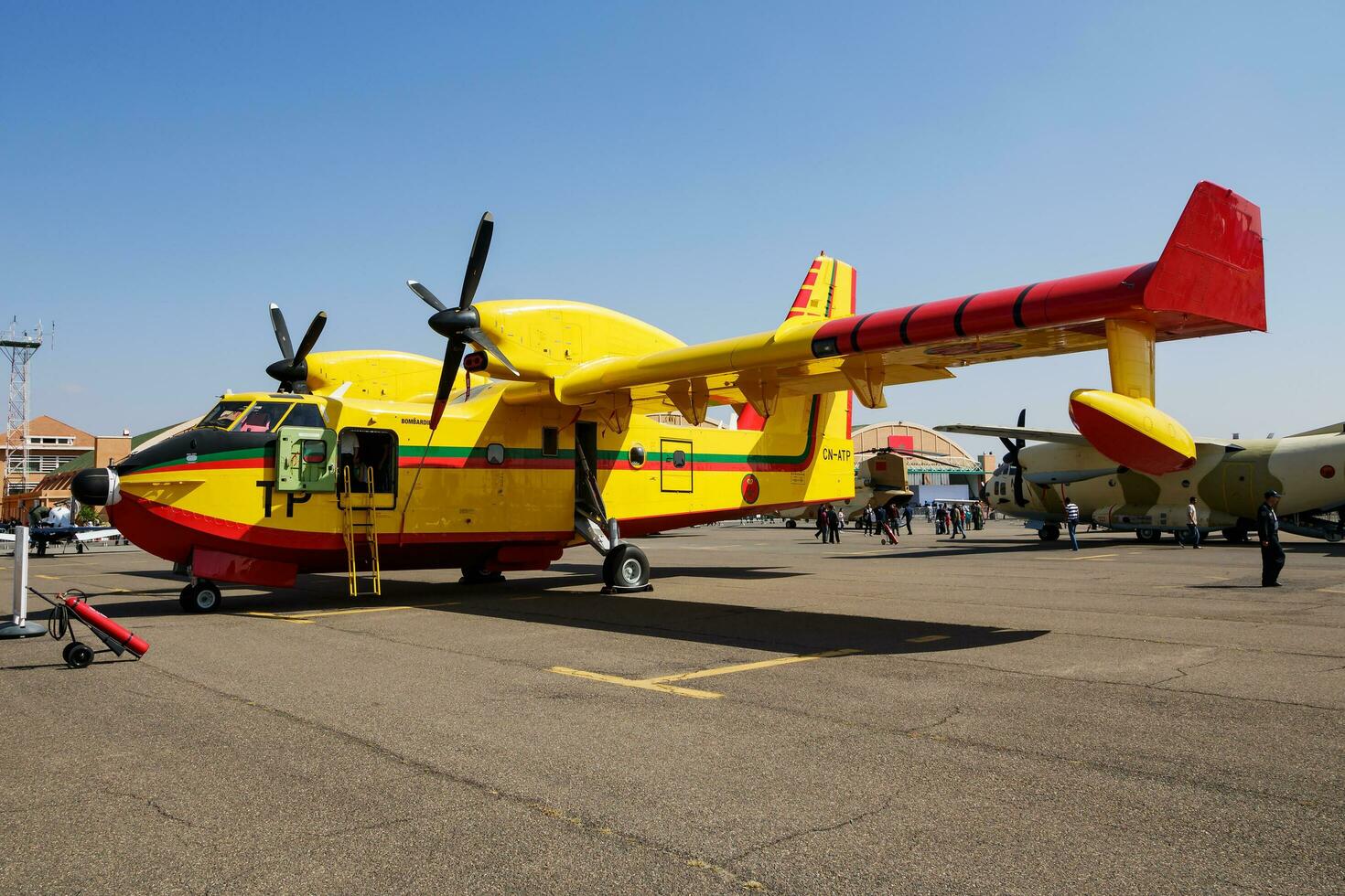 Special mission plane at air base. Air force flight operation. Aviation and aircraft. Firefighting and firekiller. Military industry. Fly and flying. photo