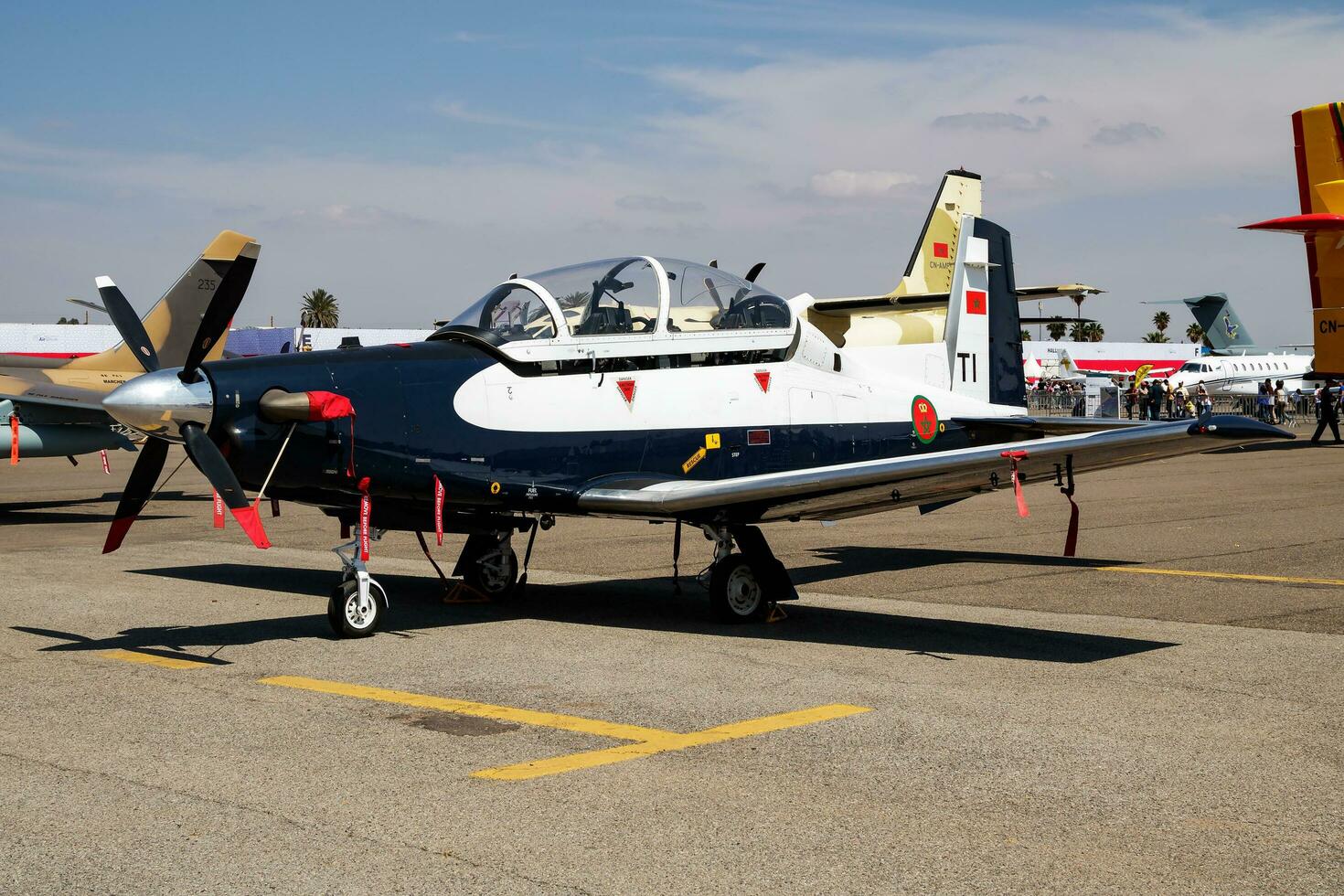 Military trainer plane at air base. Air force flight training. Aviation and aircraft. Aerobatic. Military industry. Fly and flying. photo