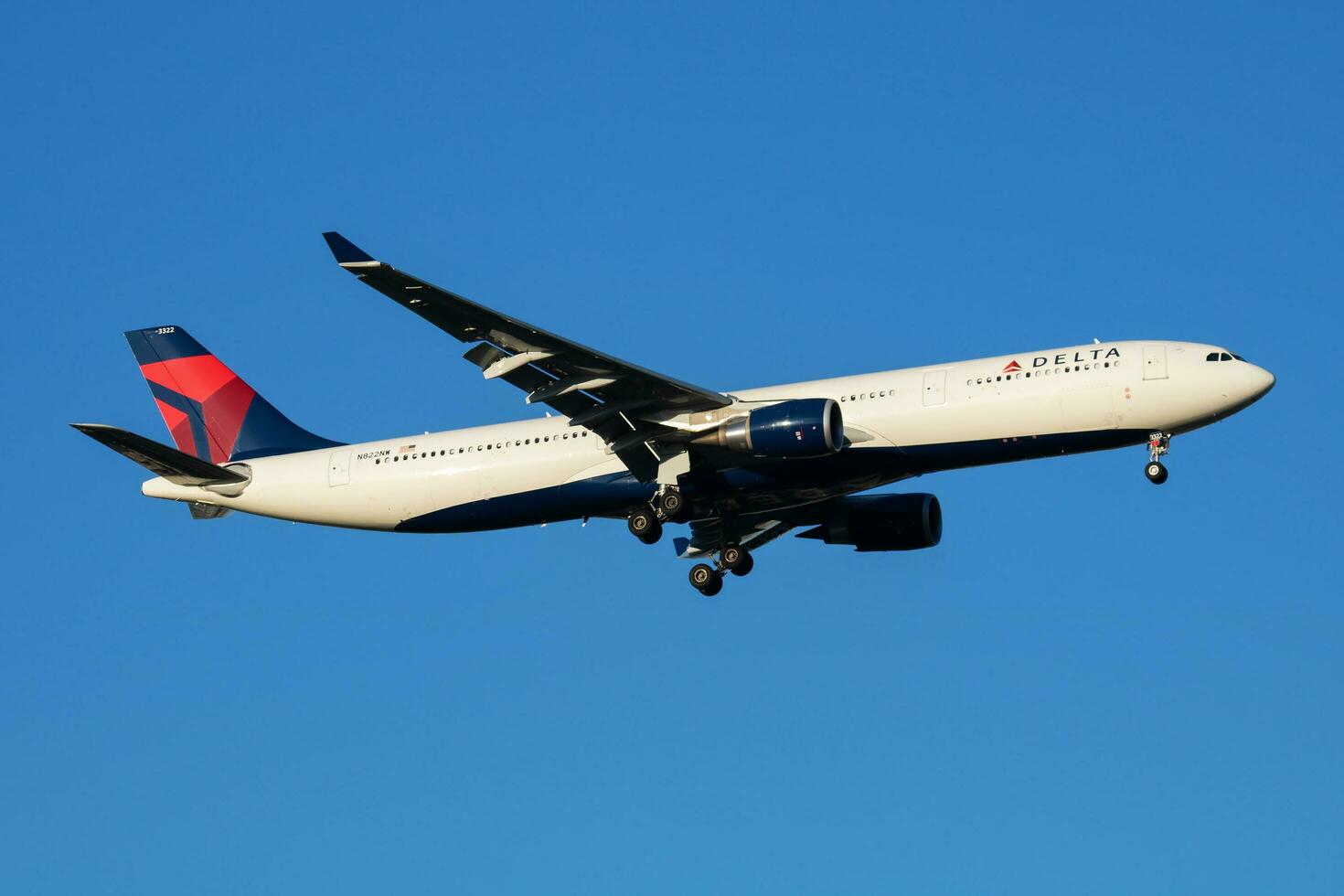 Delta Airlines passenger plane at airport. Schedule flight travel. Aviation and aircraft. Air transport. Global international transportation. Fly and flying. photo