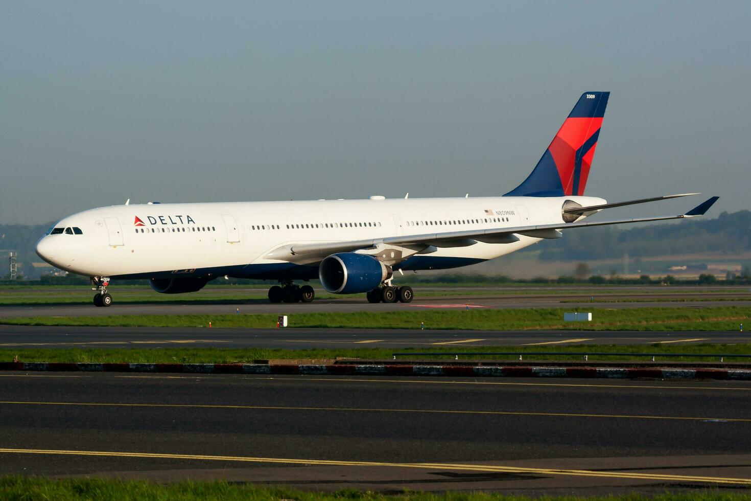 Delta Airlines Airbus A330-300 N809NW passenger plane arrival and landing at Paris Charles de Gaulle Airport photo