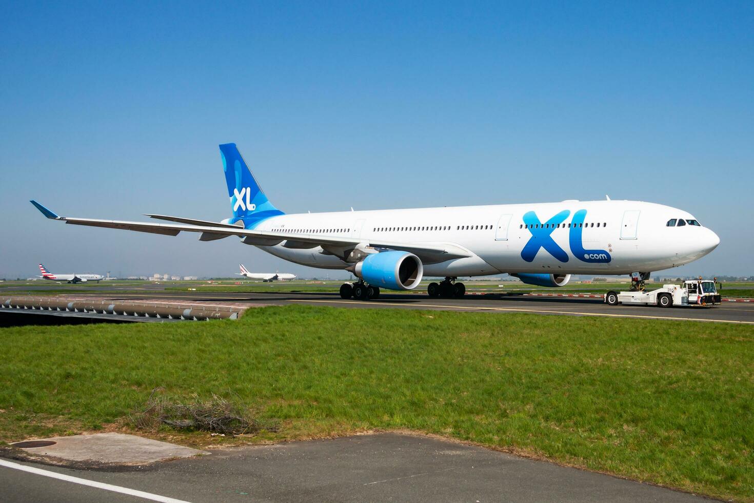 XL Airways France Airbus A330-300 F-HXLF passenger plane taxiing at Paris Charles de Gaulle Airport photo