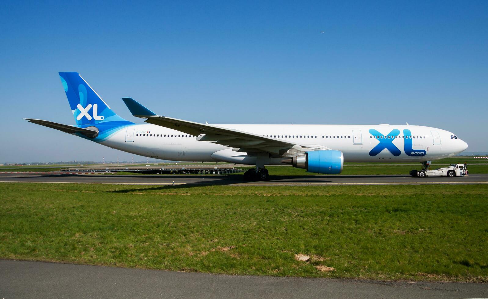 XL Airways France Airbus A330-300 F-HXLF passenger plane taxiing at Paris Charles de Gaulle Airport photo