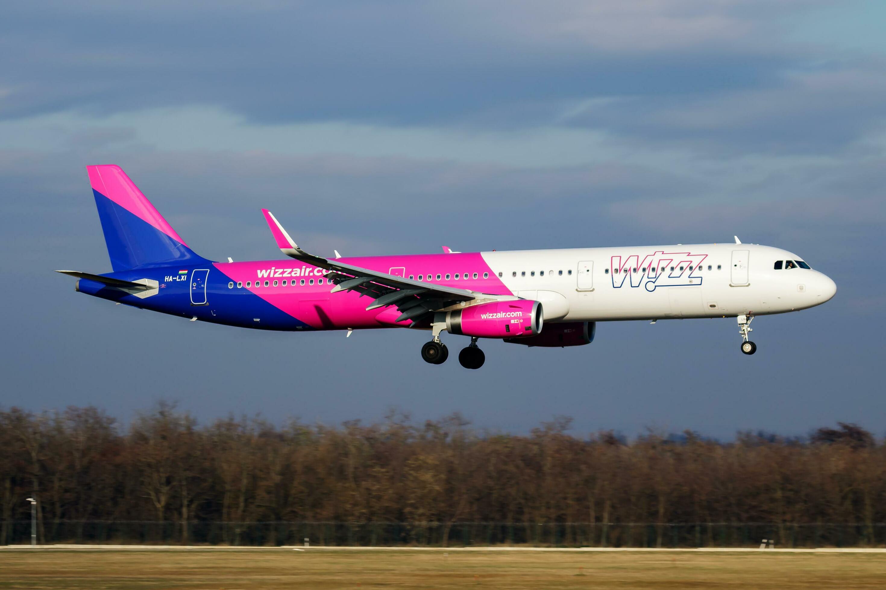 Wizz Air passenger plane at airport. Schedule flight travel. Aviation