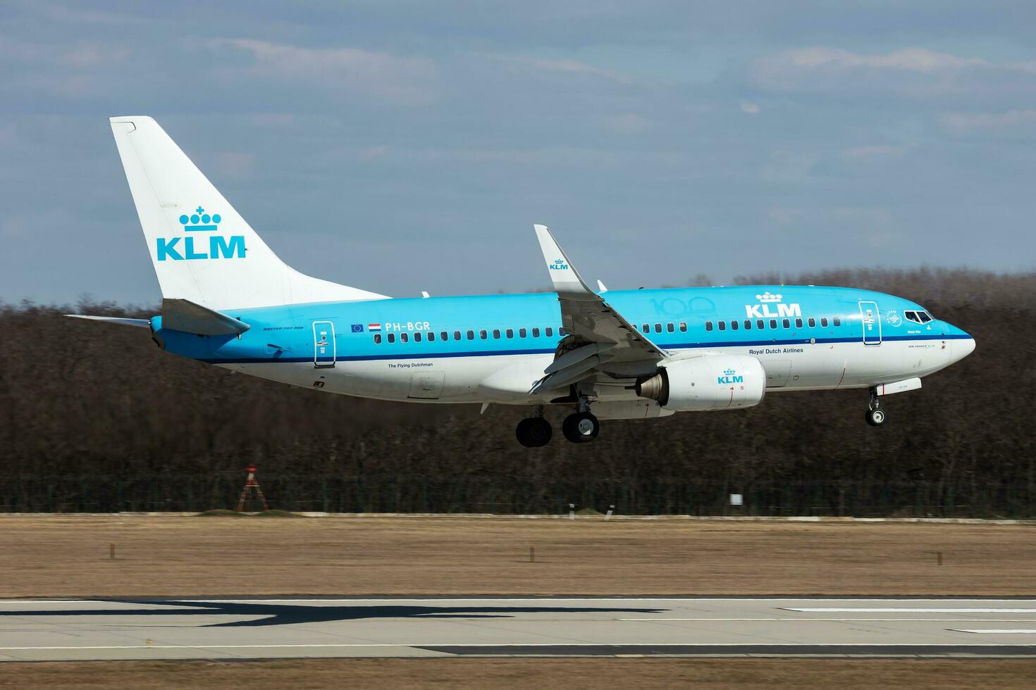 KLM passenger plane at airport. Schedule flight travel. Aviation and aircraft. Air transport. Global international transportation. Fly and flying. photo