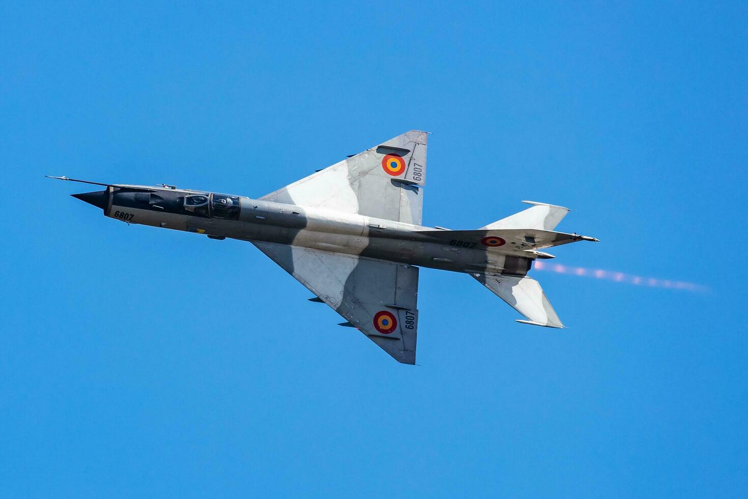 MiG-21 military fighter jet plane at air base. Air force flight operation. Aviation and aircraft. Air defense. Military industry. Fly and flying. photo