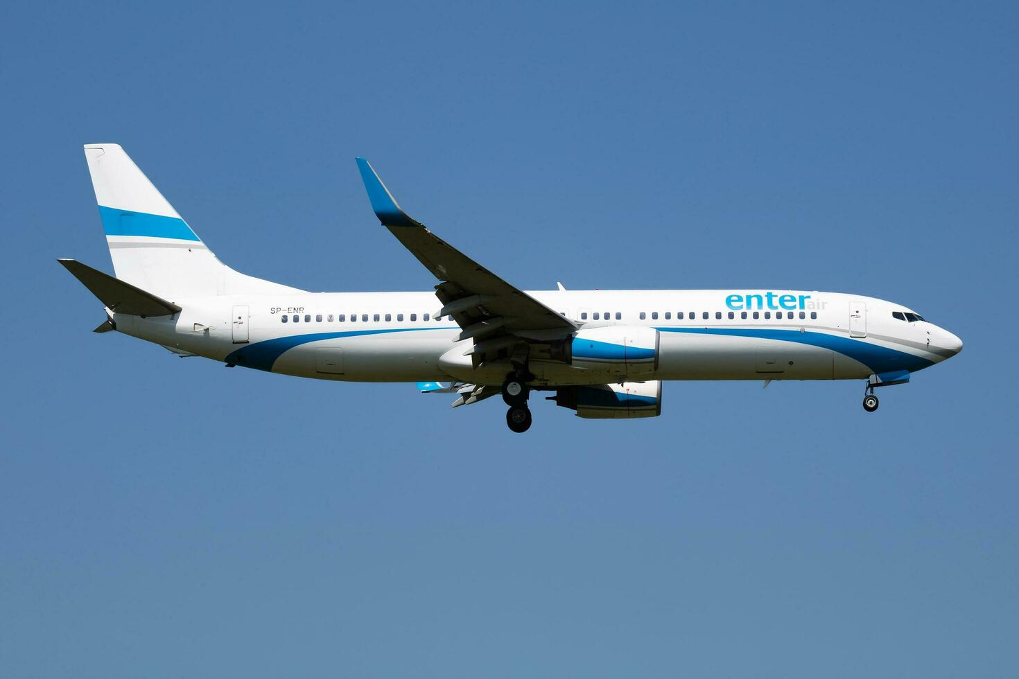 Enter Air Boeing 737-800 SP-ENR passenger plane arrival and landing at Vienna Airport photo