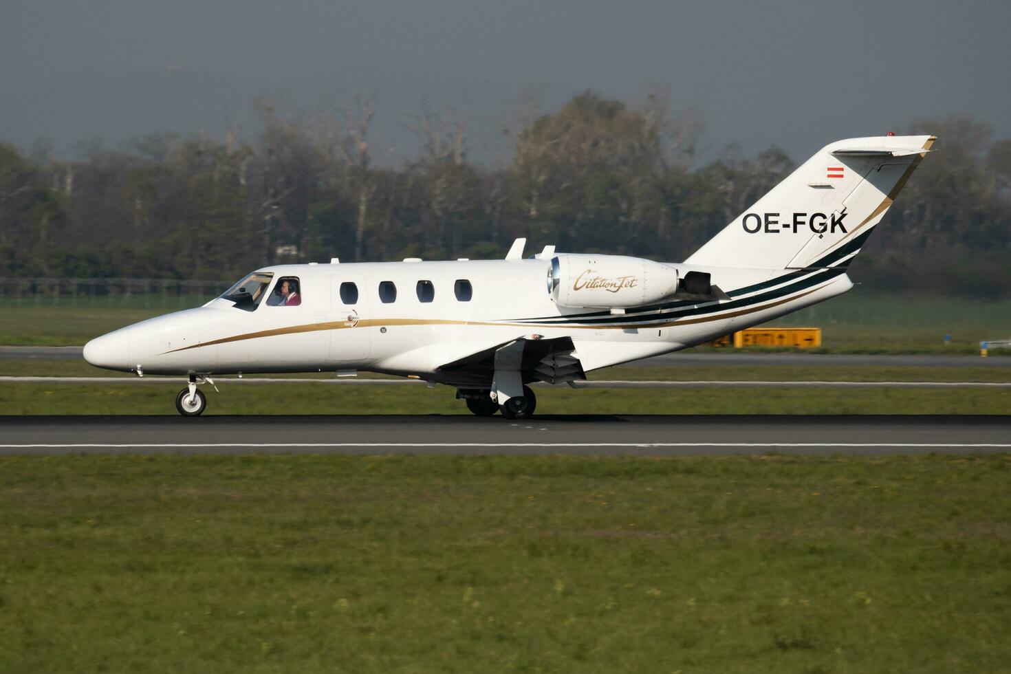 Cessna 525 CitationJet 1 OE-FGK business jet plane departure and take off at Vienna International Airport photo