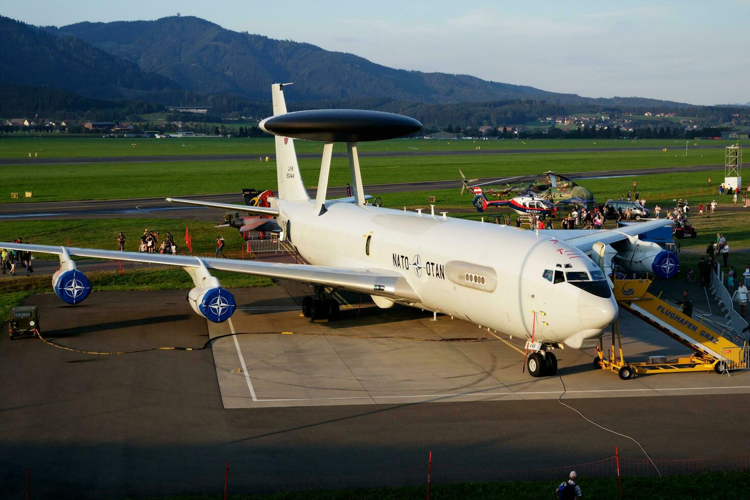 Special mission NATO AWACS plane at air base. Air force flight operation. Aviation and aircraft. Air defense. Military industry. Fly and flying. photo