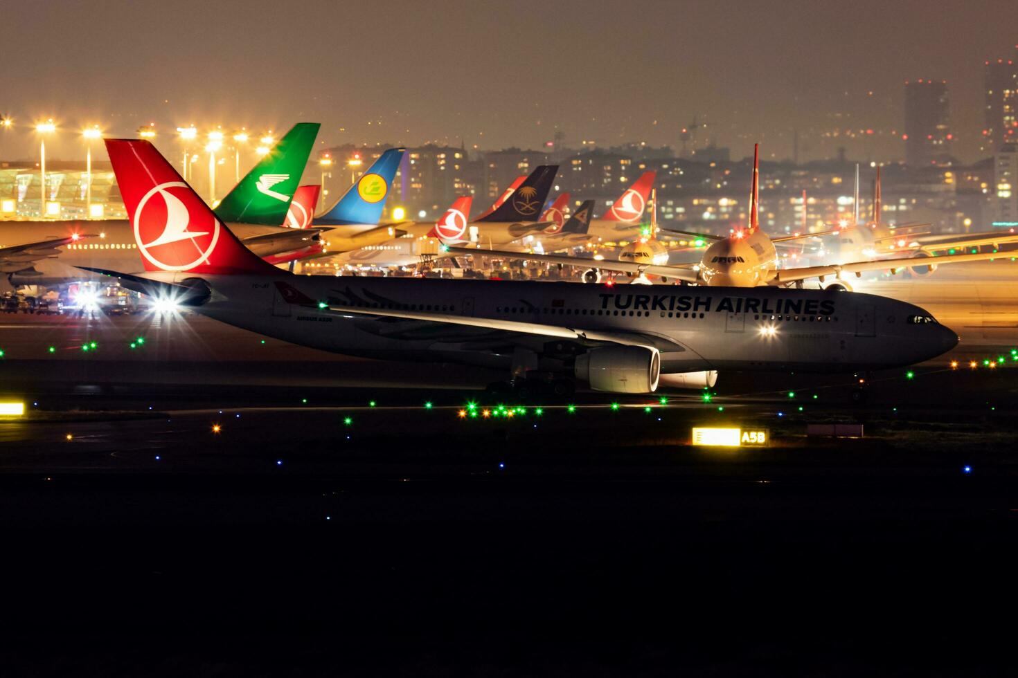 Turkish Airlines Airbus A330-200 TC-JIT passenger plane departure at Istanbul Ataturk Airport photo