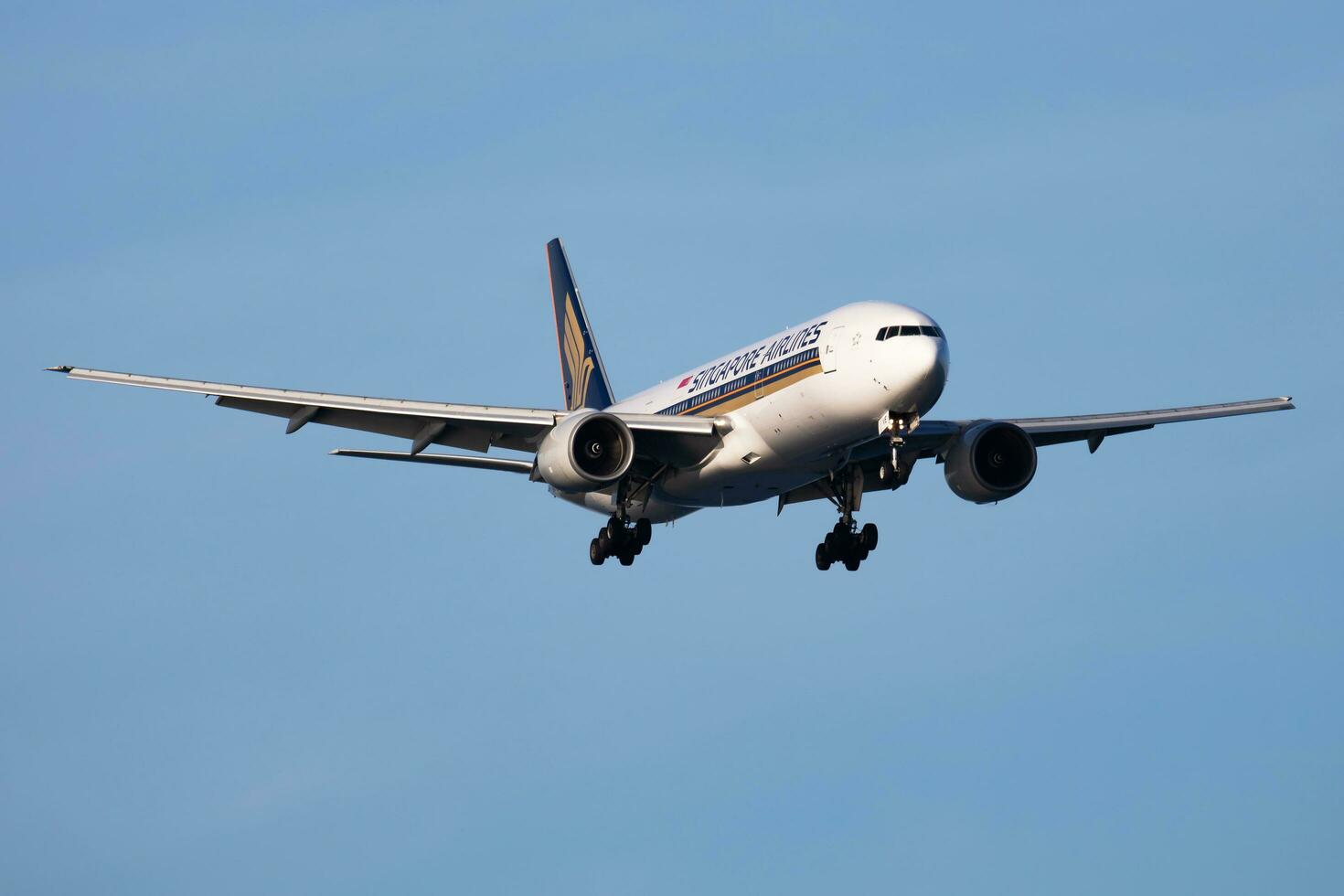 Singapore Airlines Boeing 777-200 9V-SVE passenger plane arrival and landing at Istanbul Ataturk Airport photo