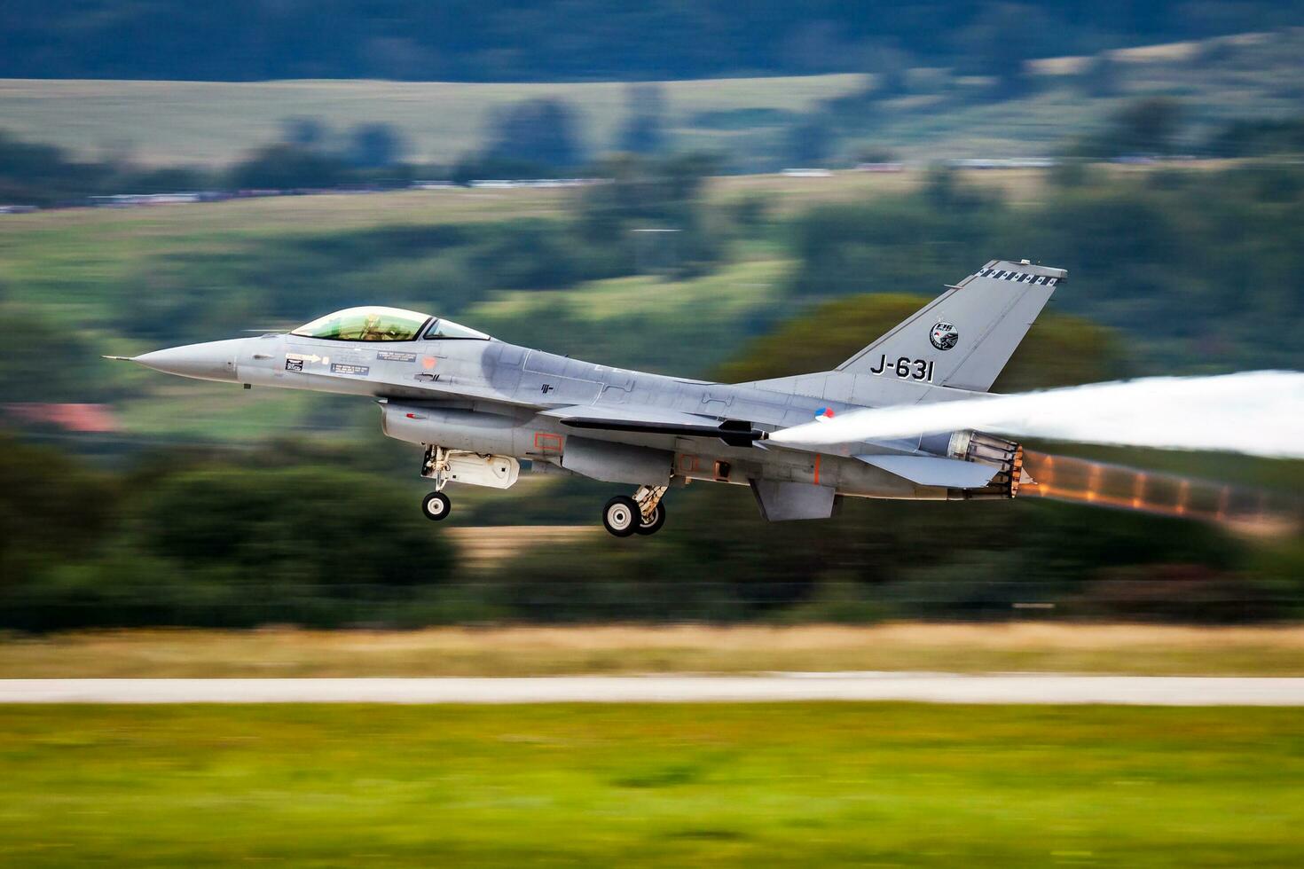 Military fighter jet plane at air base. Air force flight operation. Aviation and aircraft. Air defense. Military industry. Fly and flying. photo