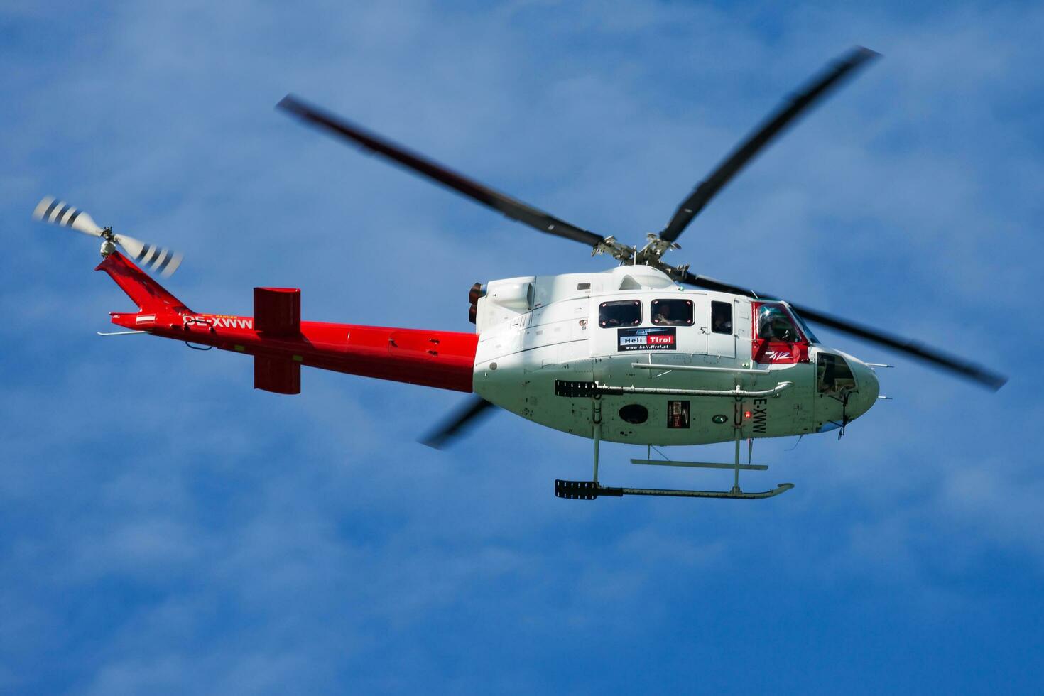 Commercial helicopter at airport and airfield. Rotorcraft. General aviation industry. Civil utility transportation. Air transport. Fly and flying. photo