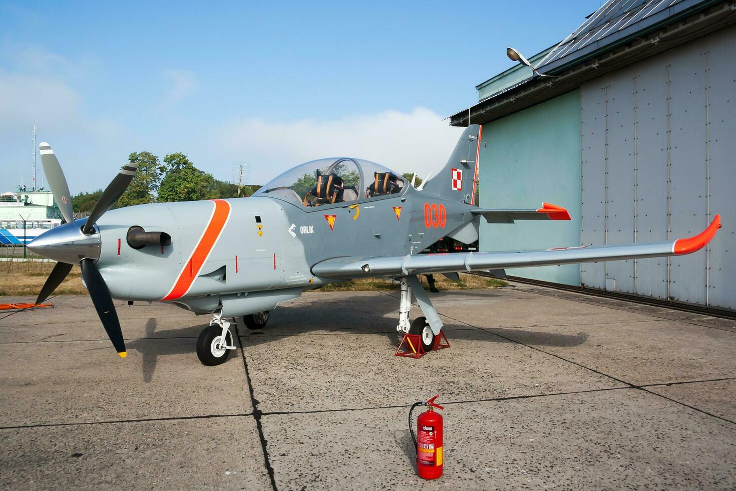 Military trainer plane at air base. Air force flight operation. Aviation and aircraft. Air defense. Military industry. Fly and flying. photo